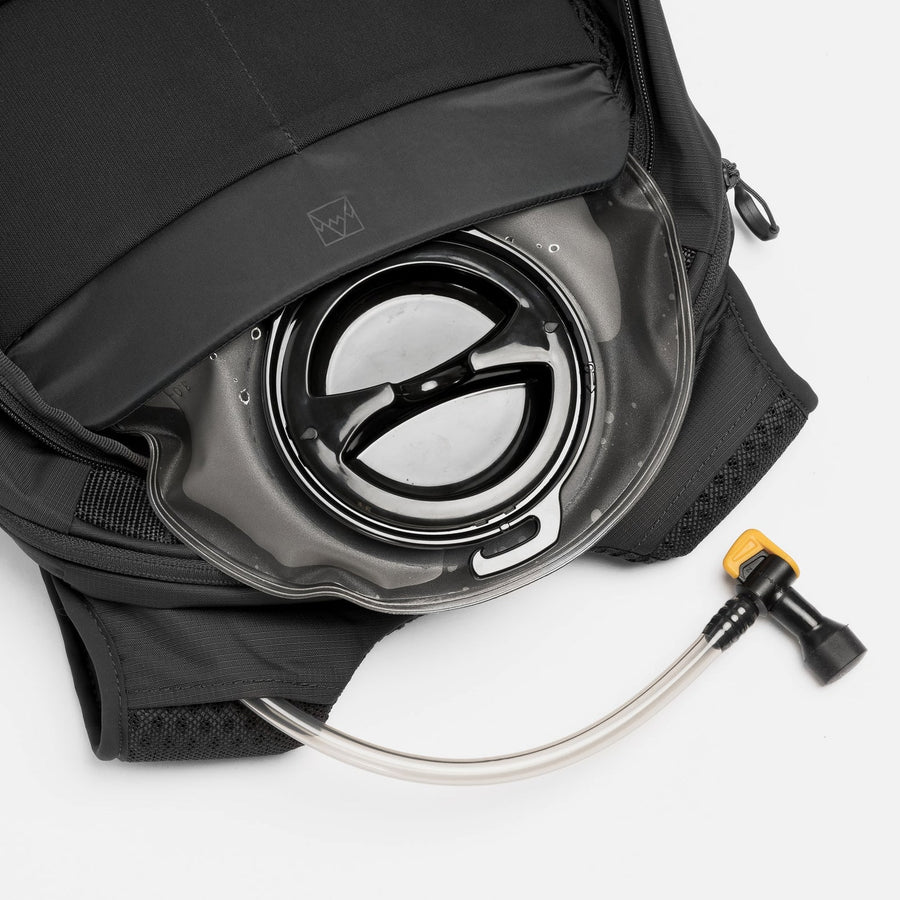 Hydration pocket, two hose exits